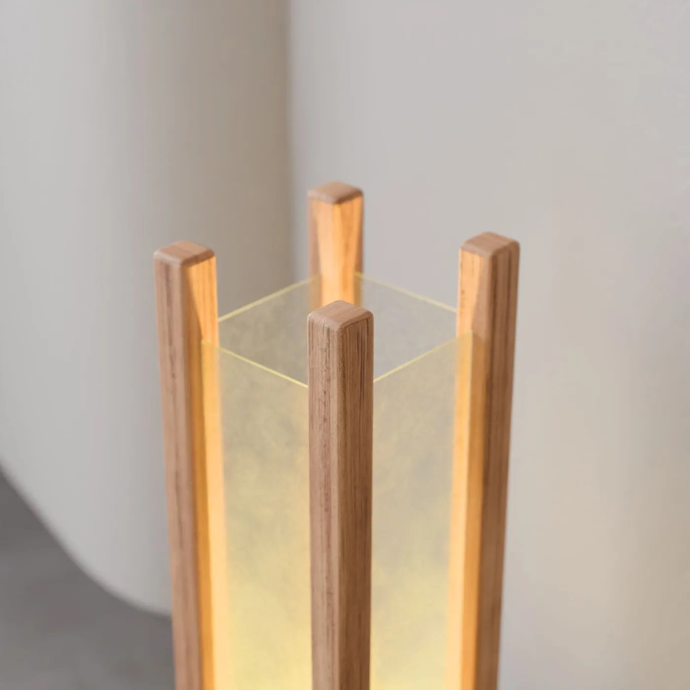 Warm-lit interior detail with layered natural materials